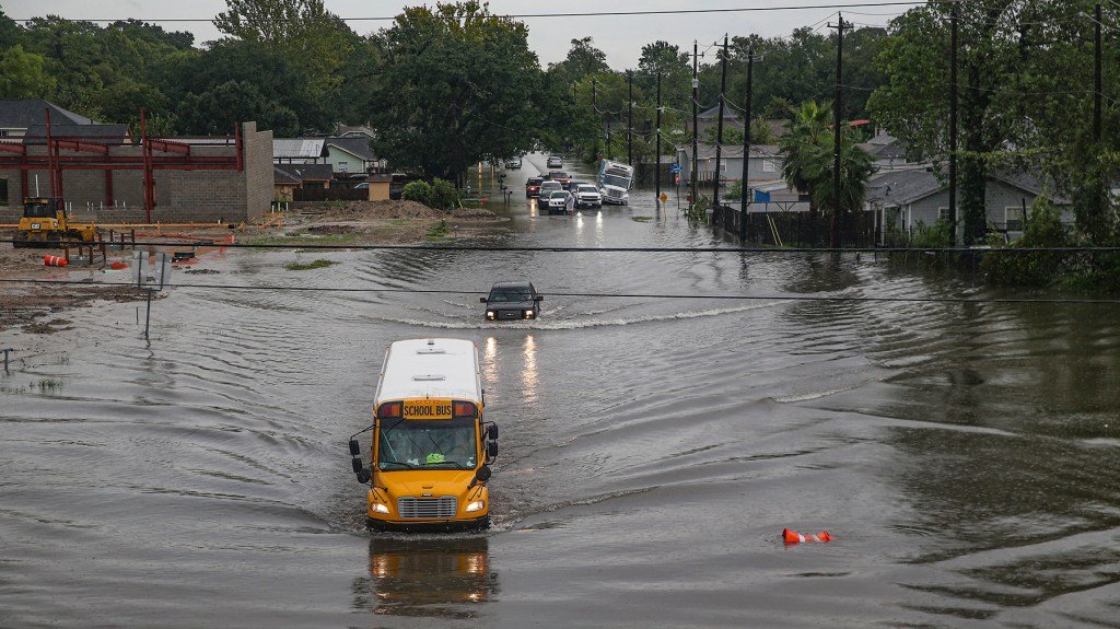 A school bus moves through a flooded roadway in Houston, Texas. Gov. Greg Abbott has declared much of Southeast Texas disaster areas after heavy rain and flooding from the remnants of Tropical Depression Imelda dumped more than two feet of water across some areas. (Photo by Thomas B. Shea/Getty Images)